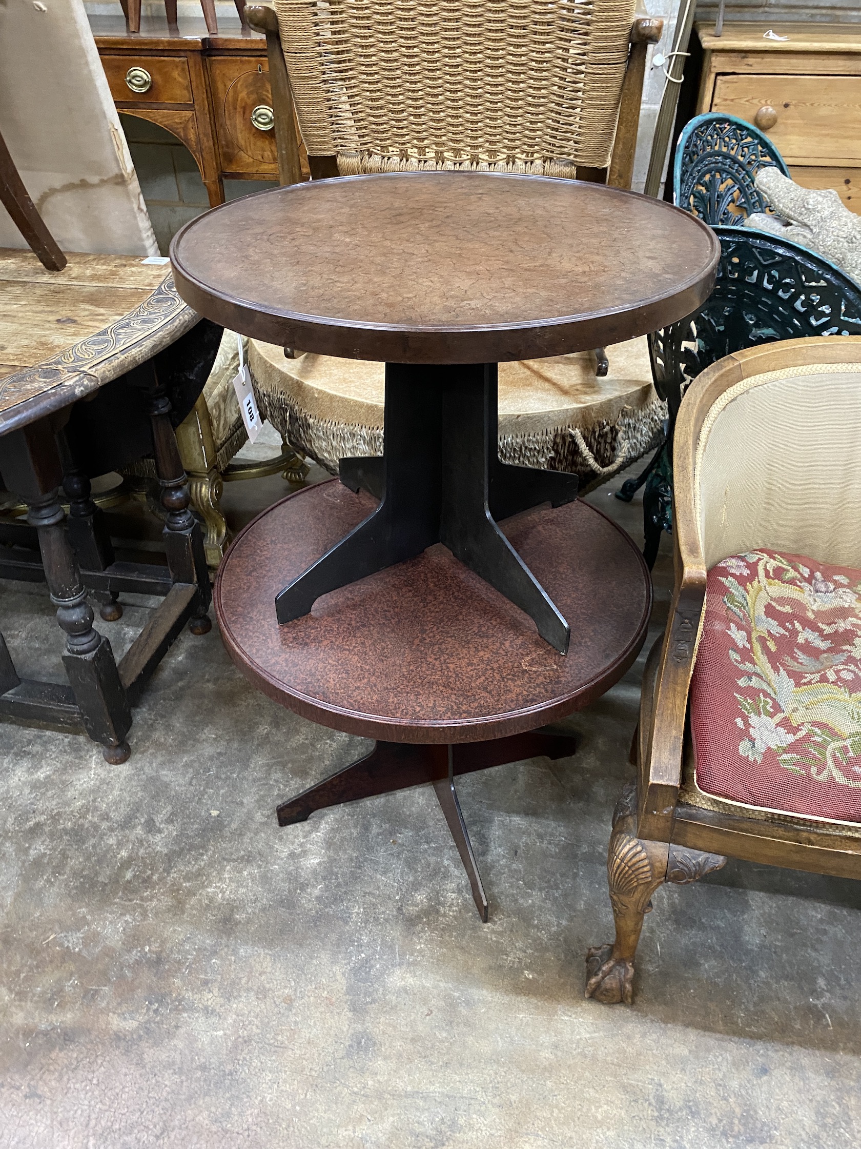 A pair of circular Bakelite side tables, circa 1940's, diameter 60cm, height 45cm